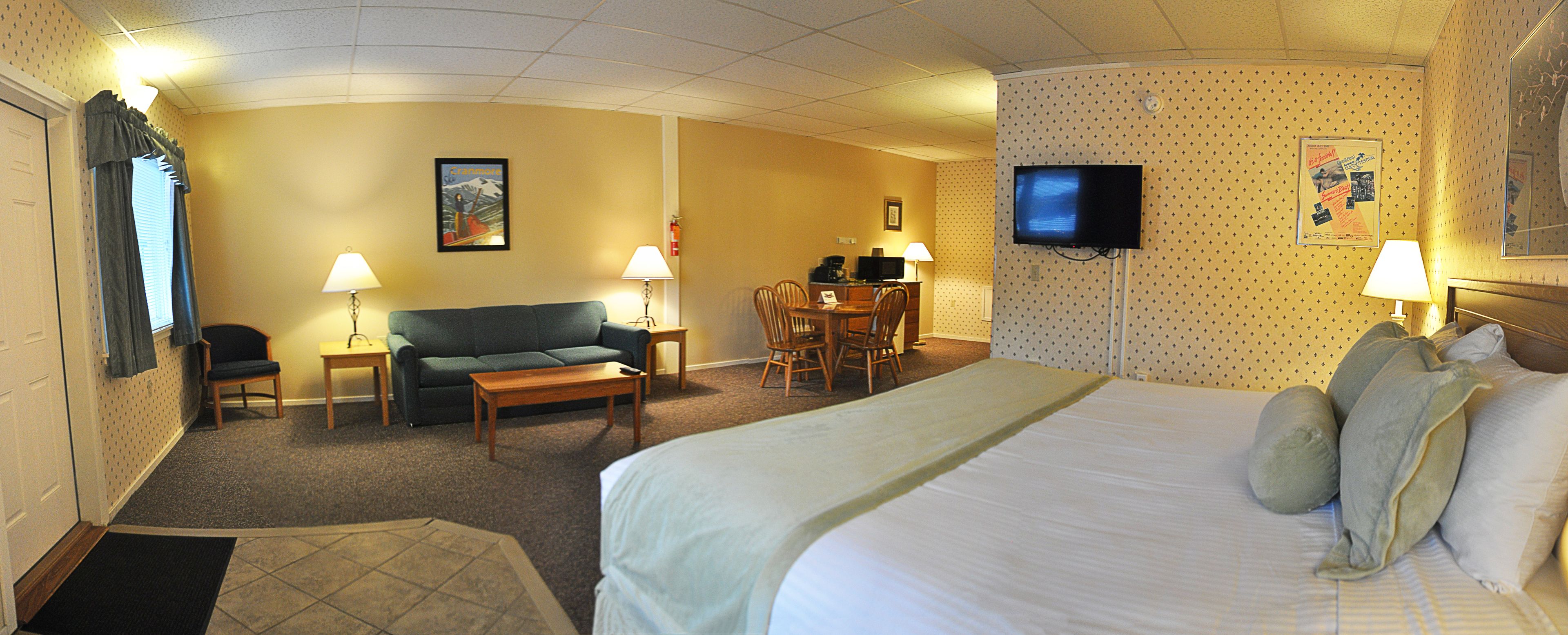 motel room, 1 king bed and queen sleep sofa | living area | flat-screen tv