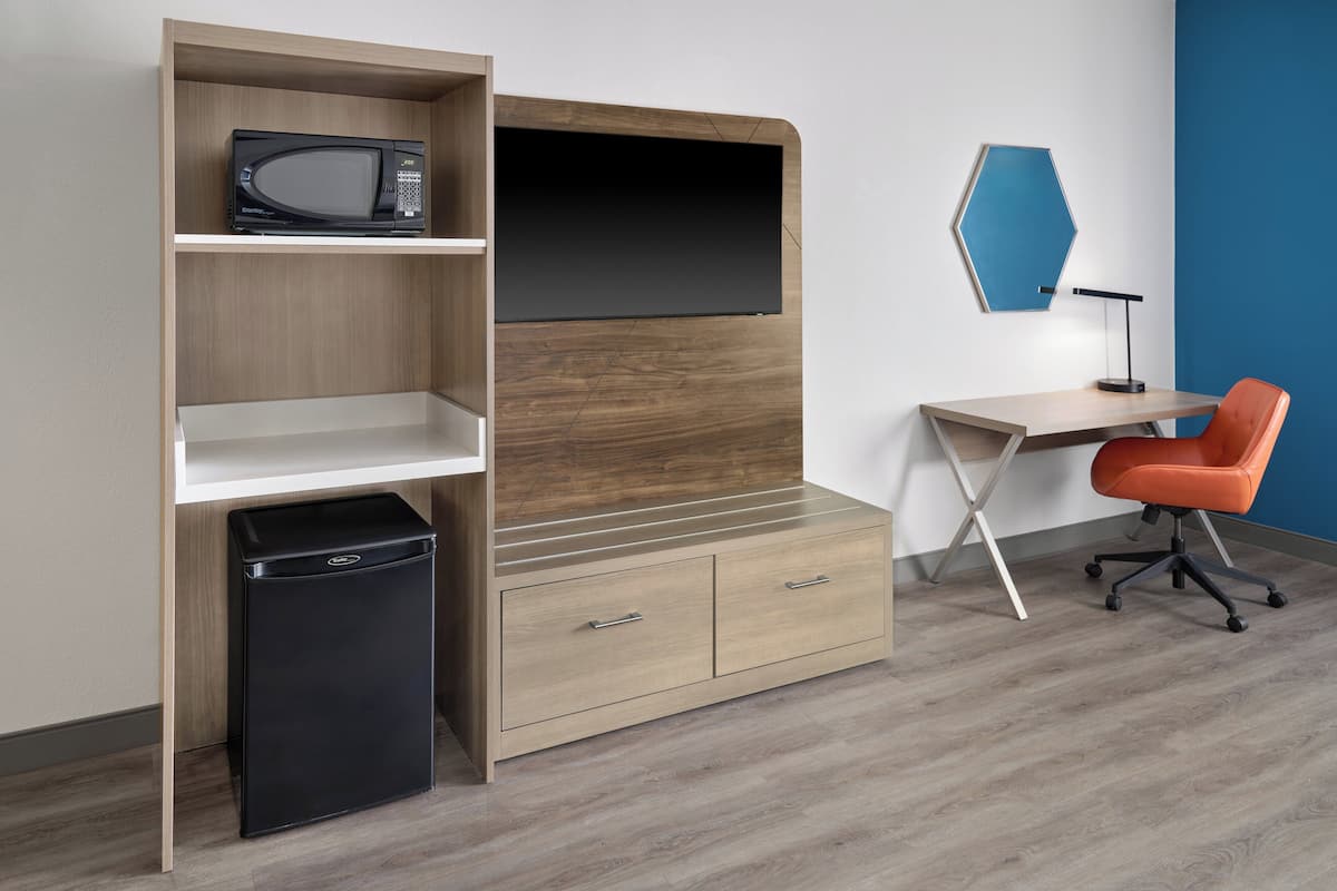 In-room safe, desk, iron/ironing board, cribs (free)
