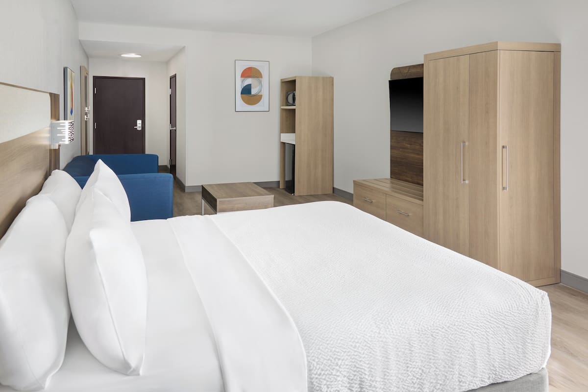 Suite, 1 King Bed, Accessible (Mobility, Transfer Shower) | In-room safe, desk, iron/ironing board, cribs (free)