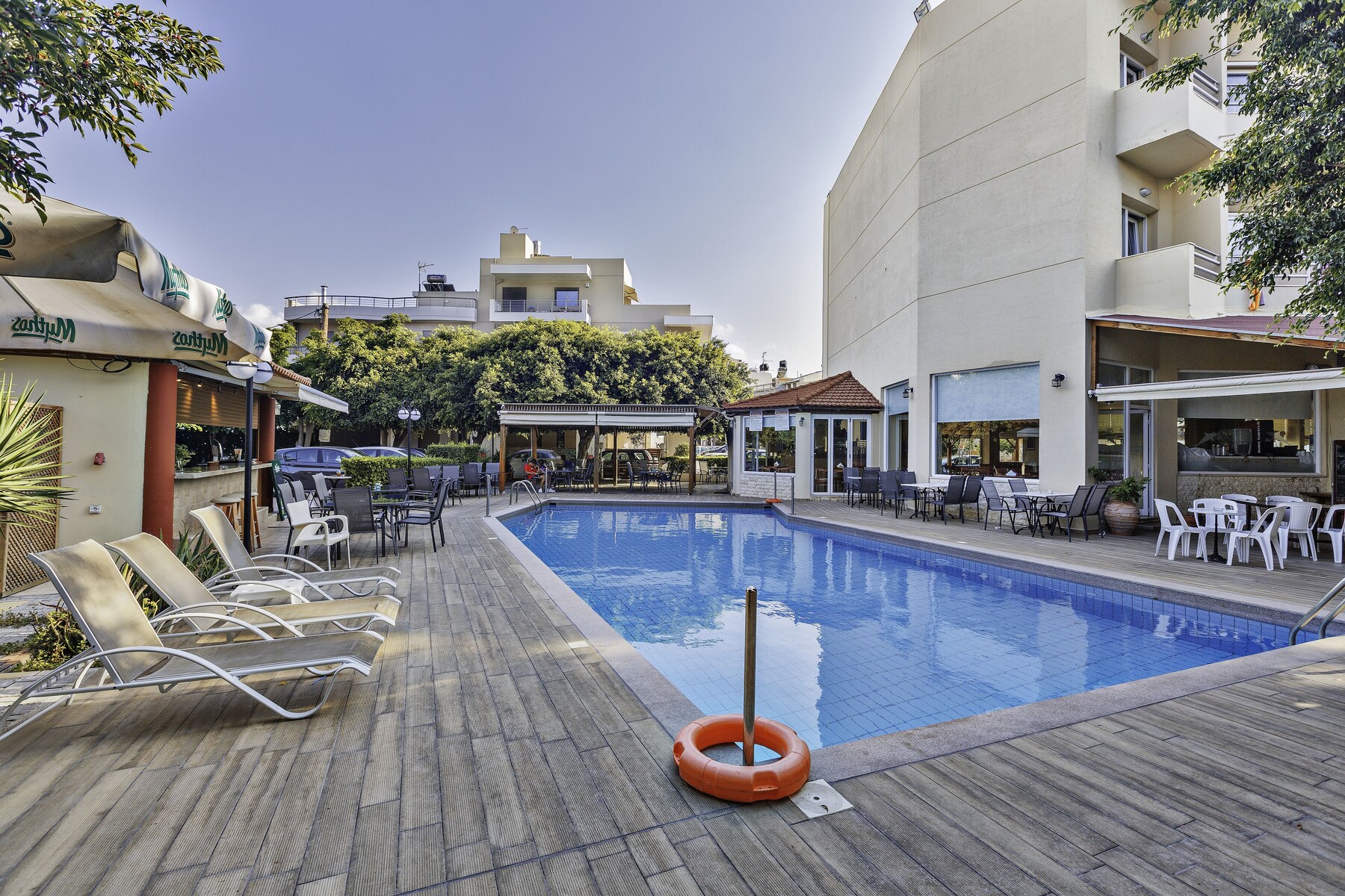 Seasonal outdoor pool, open 10:00 AM to 6:00 PM, pool loungers