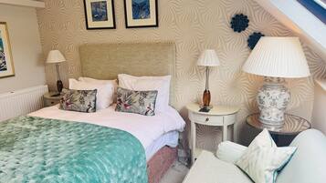 Family Room | Premium bedding, individually decorated, individually furnished, desk