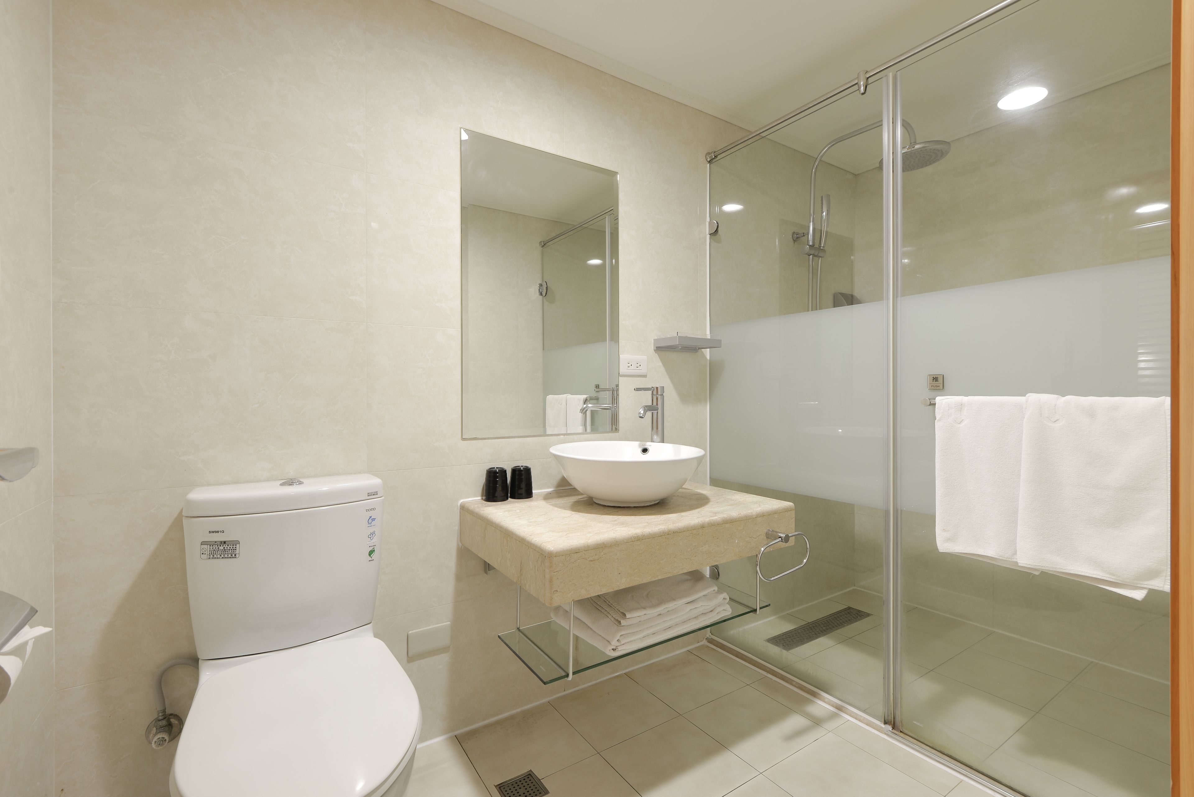 Hair dryer, slippers, towels, shampoo