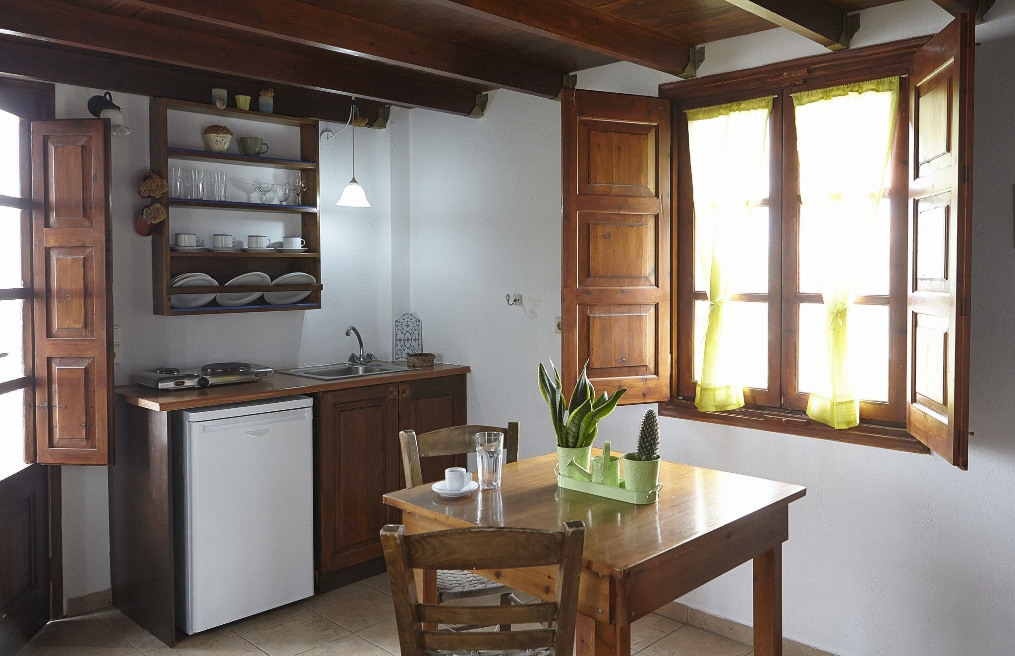 fridge, coffee/tea maker, cookware/dishes/utensils