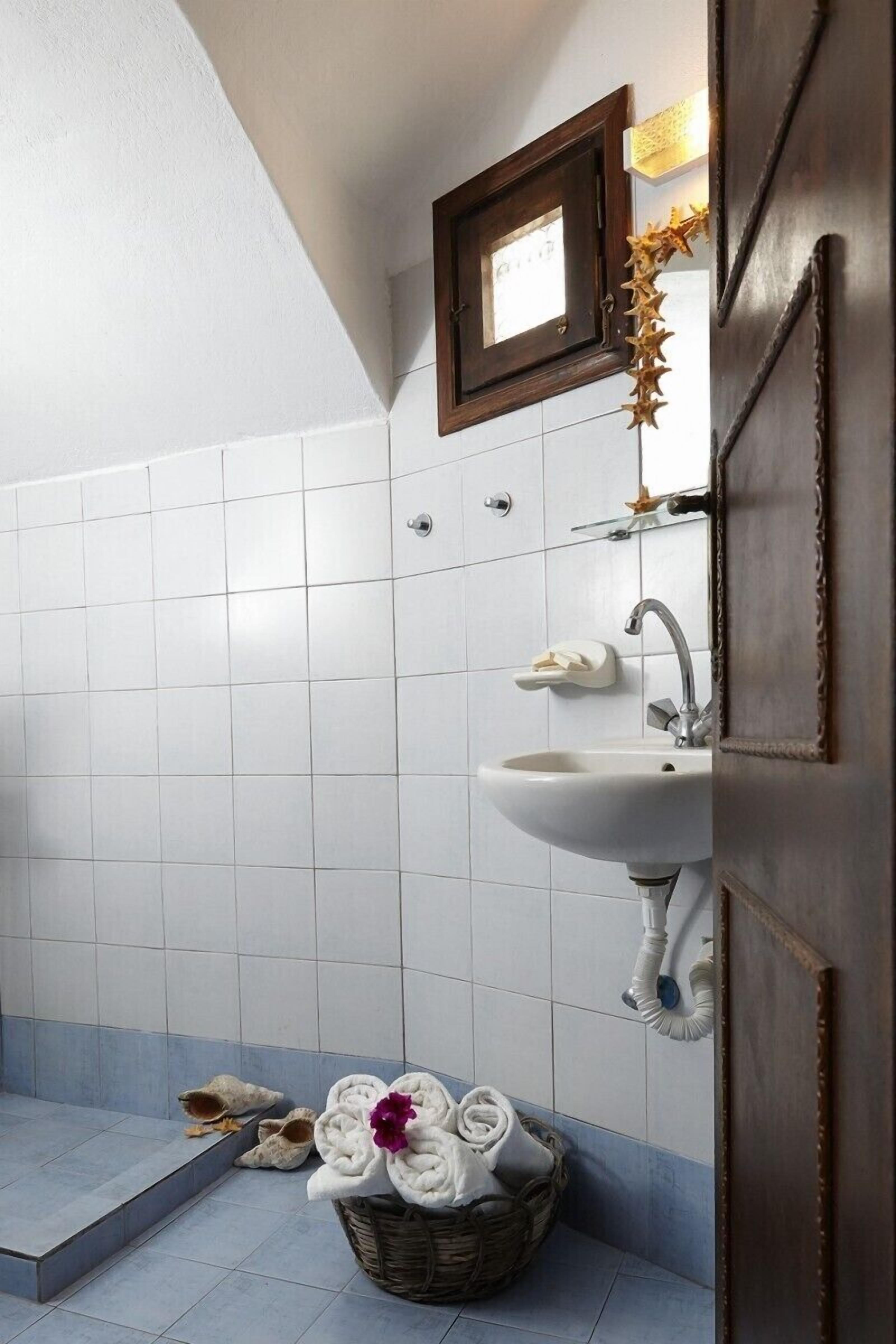 shower, eco-friendly toiletries, hair dryer, towels