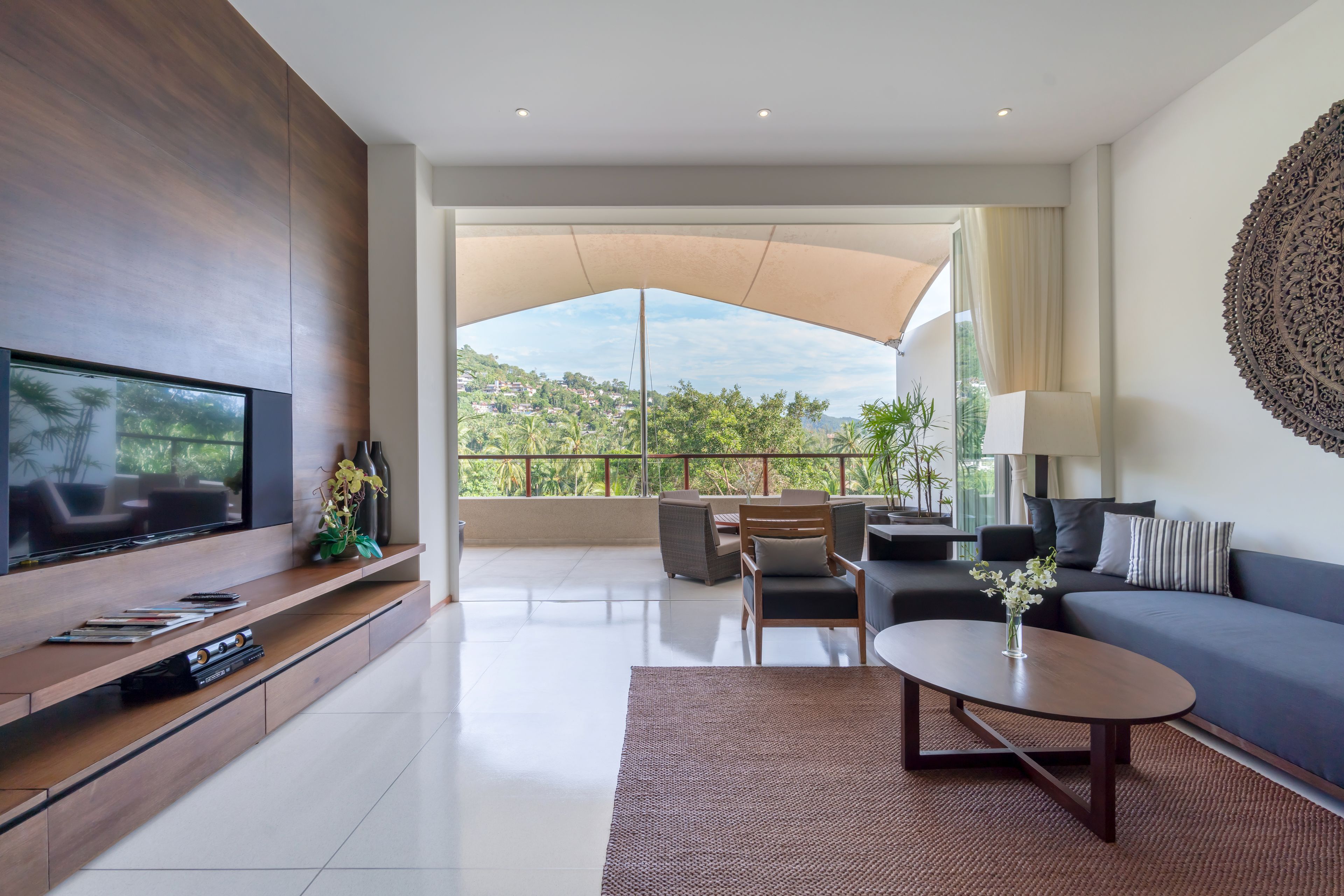 two bedroom penthouse | living area | 32-inch lcd tv with satellite channels, tv, dvd player