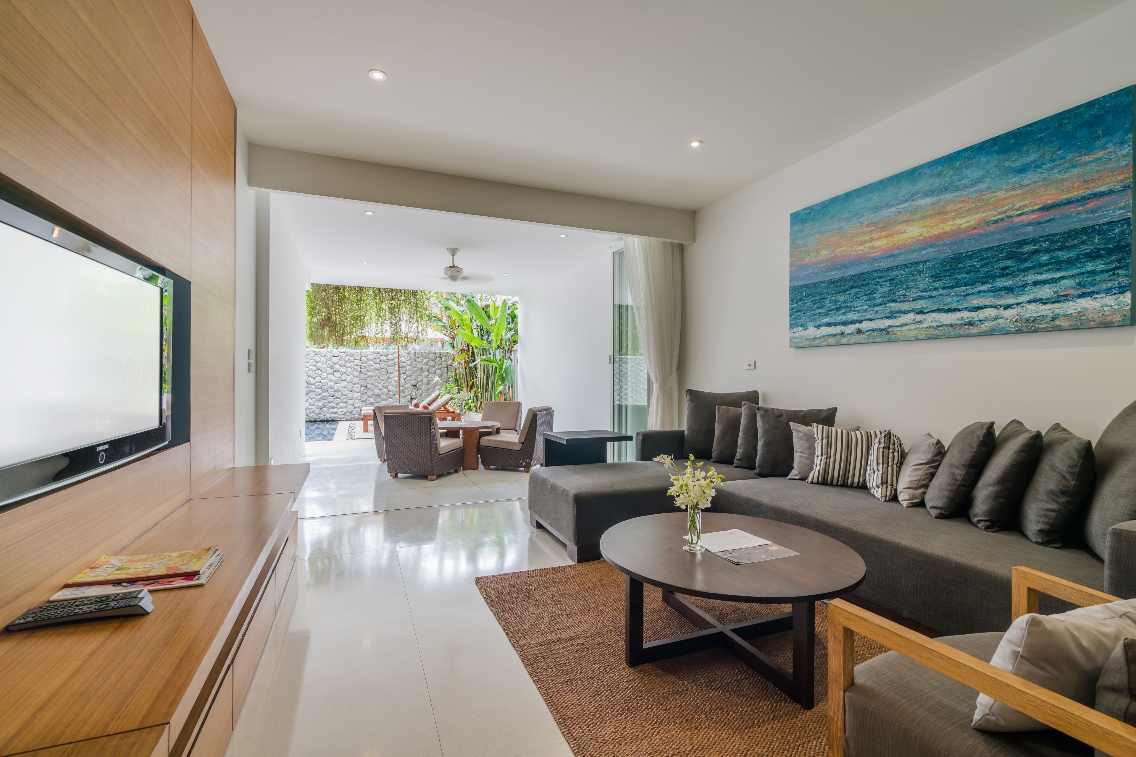 two bedroom pool residence | living area | 32-inch lcd tv with satellite channels, tv, dvd player