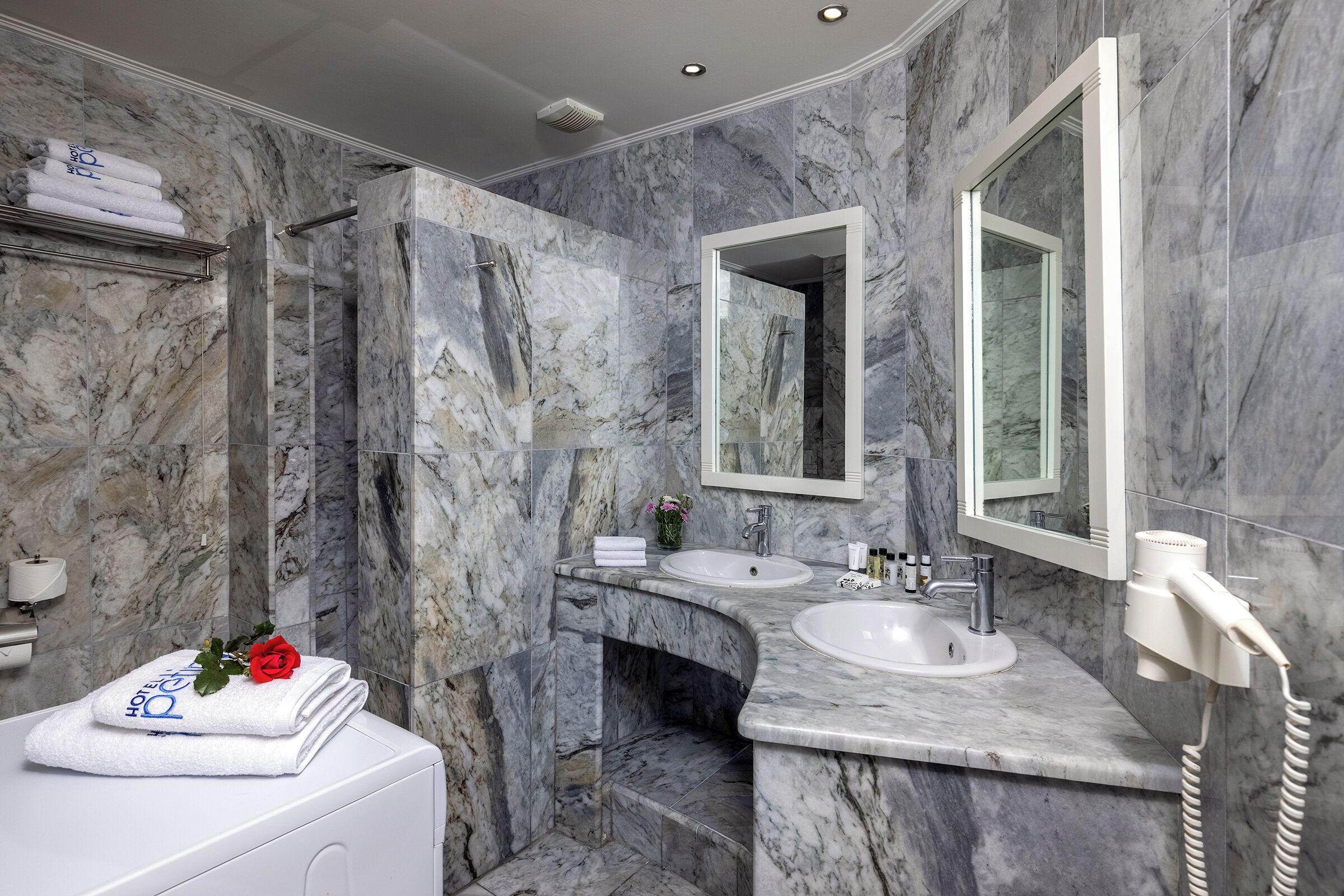 standard triple room (adjacent building) | bathroom | shower, free toiletries, hair dryer, towels