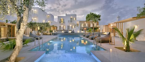 Seasonal outdoor pool, pool umbrellas, pool loungers