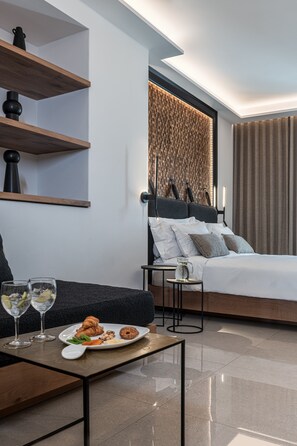 Junior Suite, Partial Sea View | In-room safe, individually decorated, individually furnished, desk
