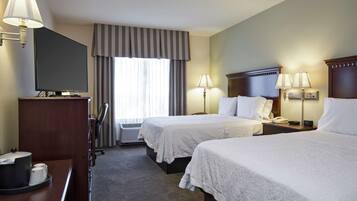 Two queen beds non smoking | Desk, iron/ironing board, free cots/infant beds, rollaway beds
