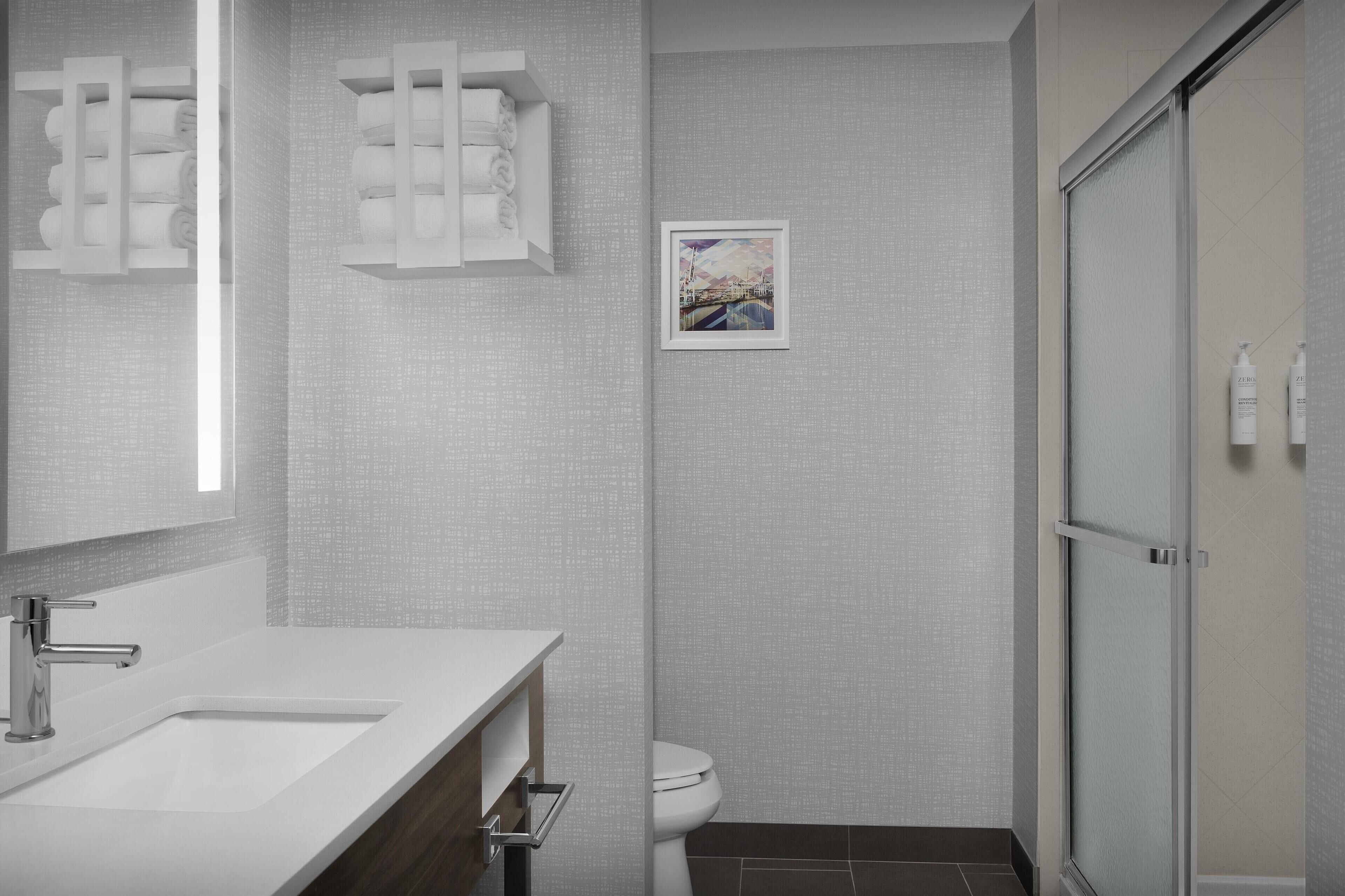 combined shower/bathtub, free toiletries, hair dryer, towels