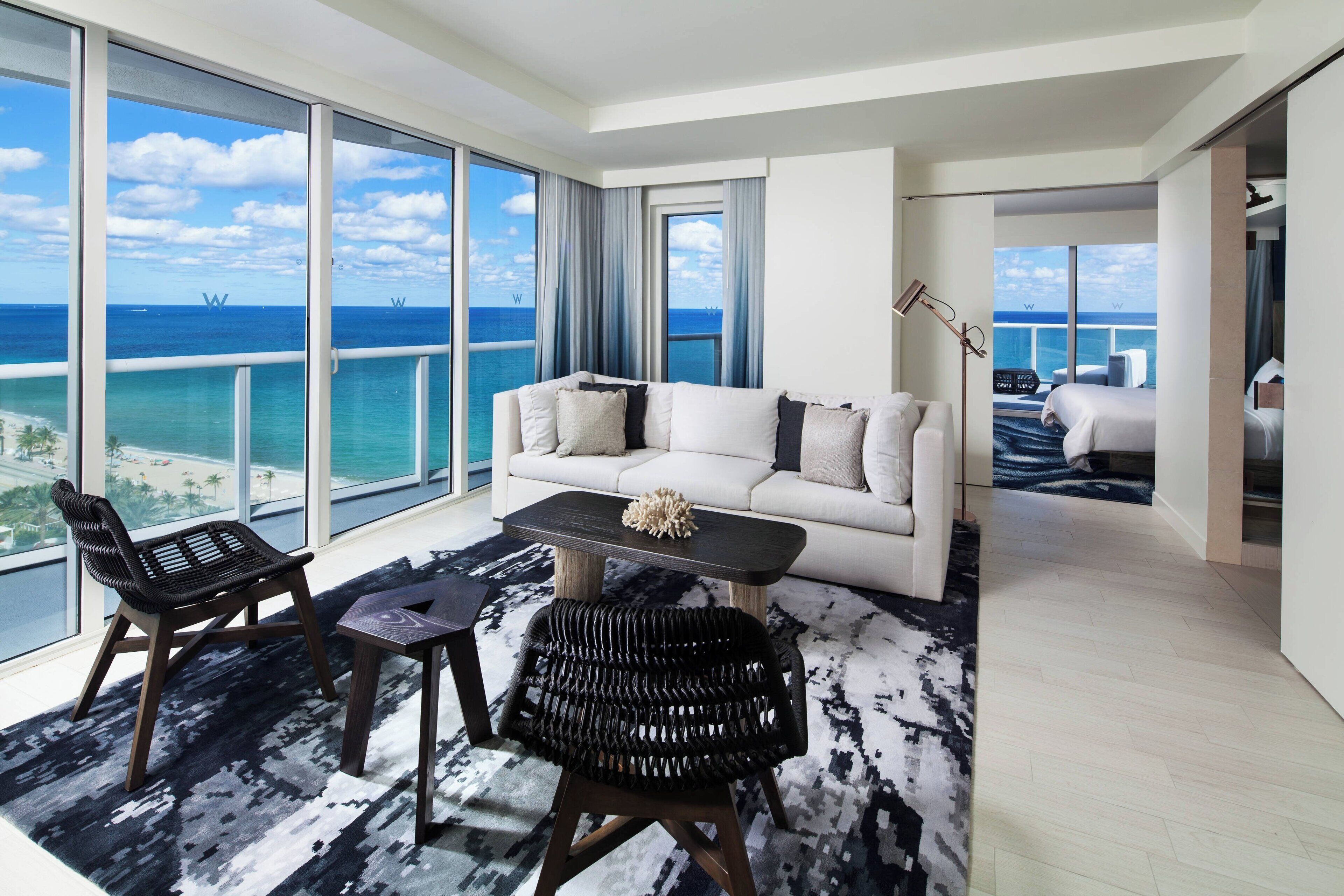 Suite, 1 Bedroom, Oceanfront | Living room | 50-inch TV with cable channels, iPod dock