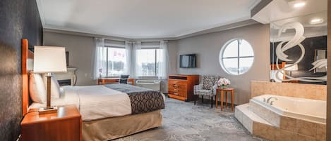 King Suite with Jetted Tub | 1 bedroom, down comforters, in-room safe, desk