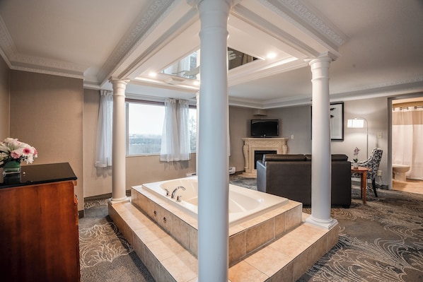 Chambre luxueuse, 1 très grand lit, non-fumeur | Couette en duvet, coffre-fort pour ordinateur portable, bureau