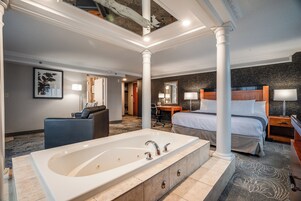 Luxury King Suite with Jetted Tub | Down comforters, in-room safe, desk, blackout drapes