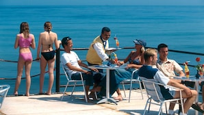 A group of people on a boat with a view of the ocean. - Sahara Beach Aquapark (Monastir)