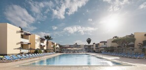 Outdoor pool, pool umbrellas, pool loungers