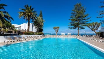 Indoor pool, outdoor pool, pool umbrellas, sun loungers