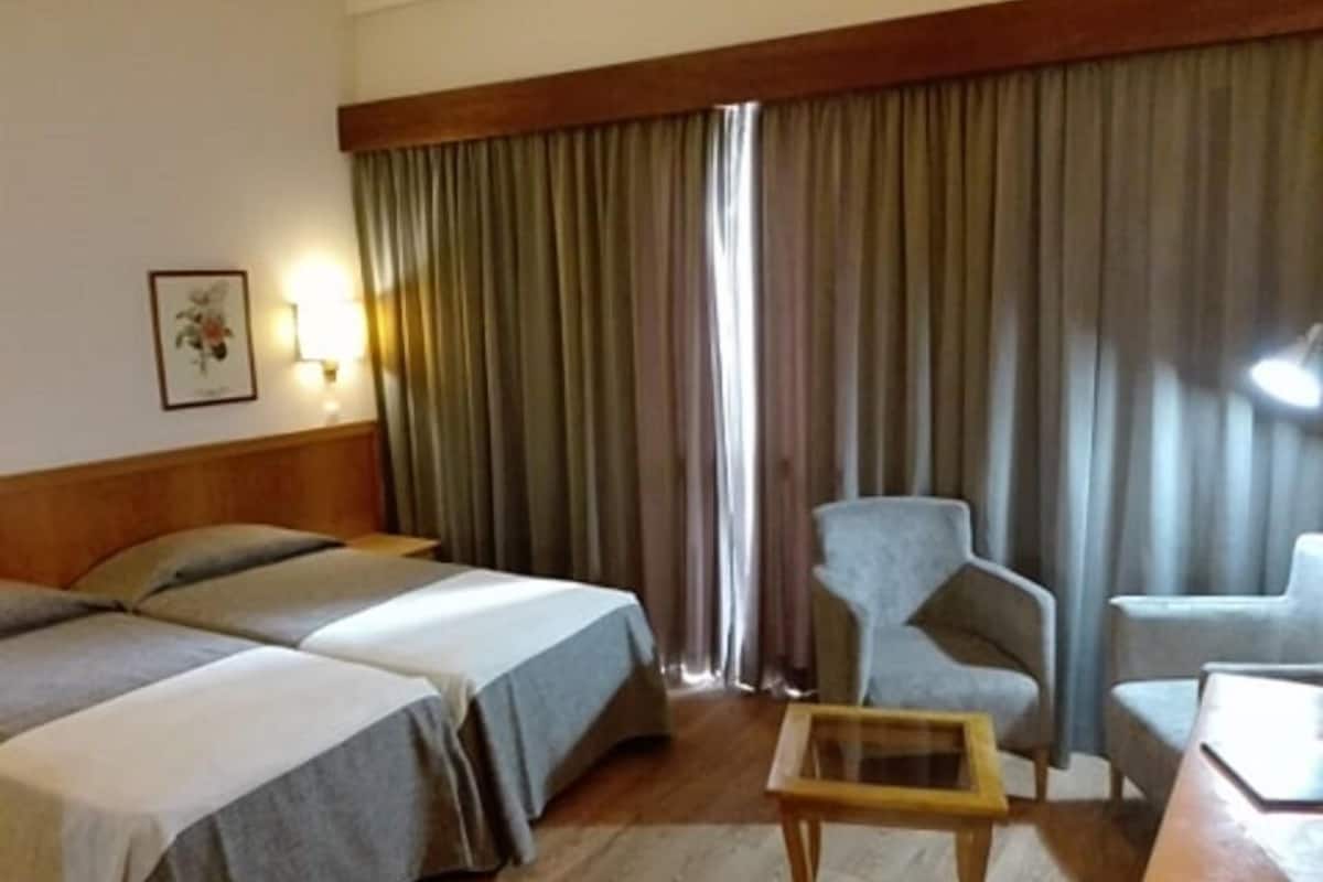 Double or Twin Room | In-room safe, WiFi (free)