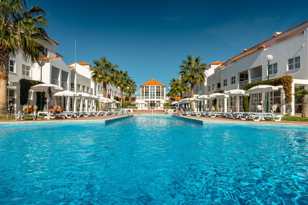 Indoor pool, outdoor pool, pool umbrellas, sun loungers