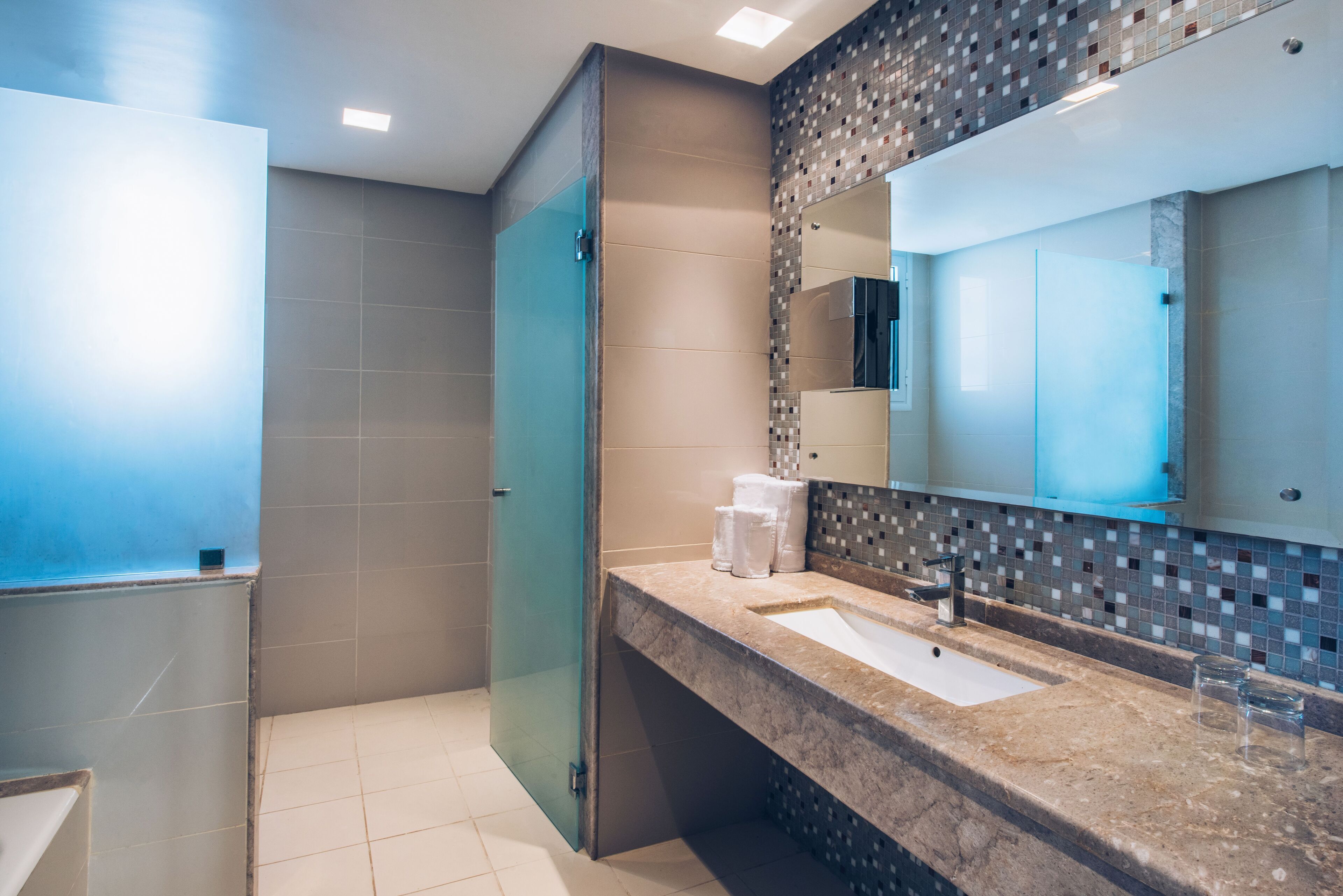 superior suite | bathroom | bathtub, deep-soaking bathtub, eco-friendly toiletries, towels