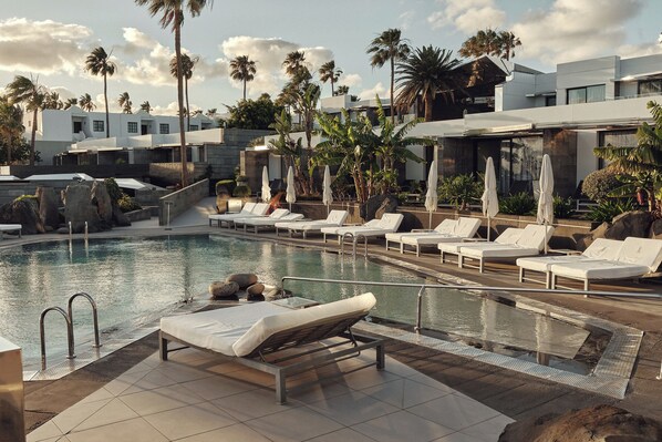 Outdoor pool, pool umbrellas, pool loungers