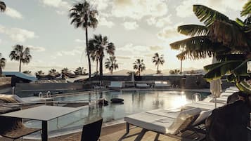 Outdoor pool, pool umbrellas, pool loungers