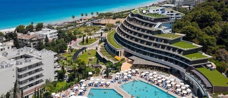 Indoor pool, 3 outdoor pools, open 9:00 AM to 6:00 PM, pool umbrellas