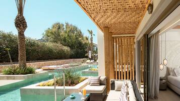 Superior Junior Suite Garden View Sharing Pool | Terrace/patio