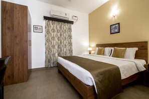Habitación Premium | Ropa de cama de alta calidad y cortinas blackout 