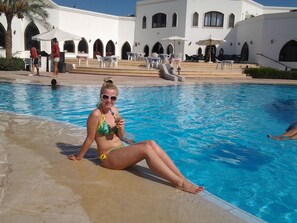 2 outdoor pools, pool umbrellas, pool loungers