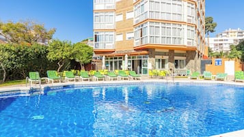Outdoor pool, open 10:00 AM to 8:00 PM, pool loungers