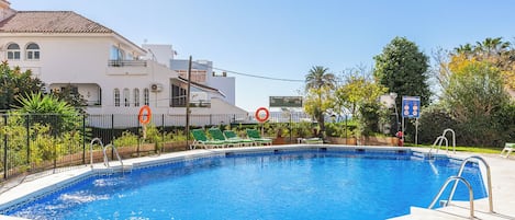 Outdoor pool, open 10:00 AM to 8:00 PM, sun loungers