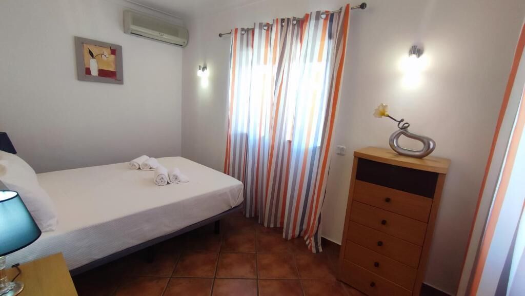 Apartment, 2 Bedrooms, Ground Floor | In-room safe, individually furnished, iron/ironing board, bed sheets