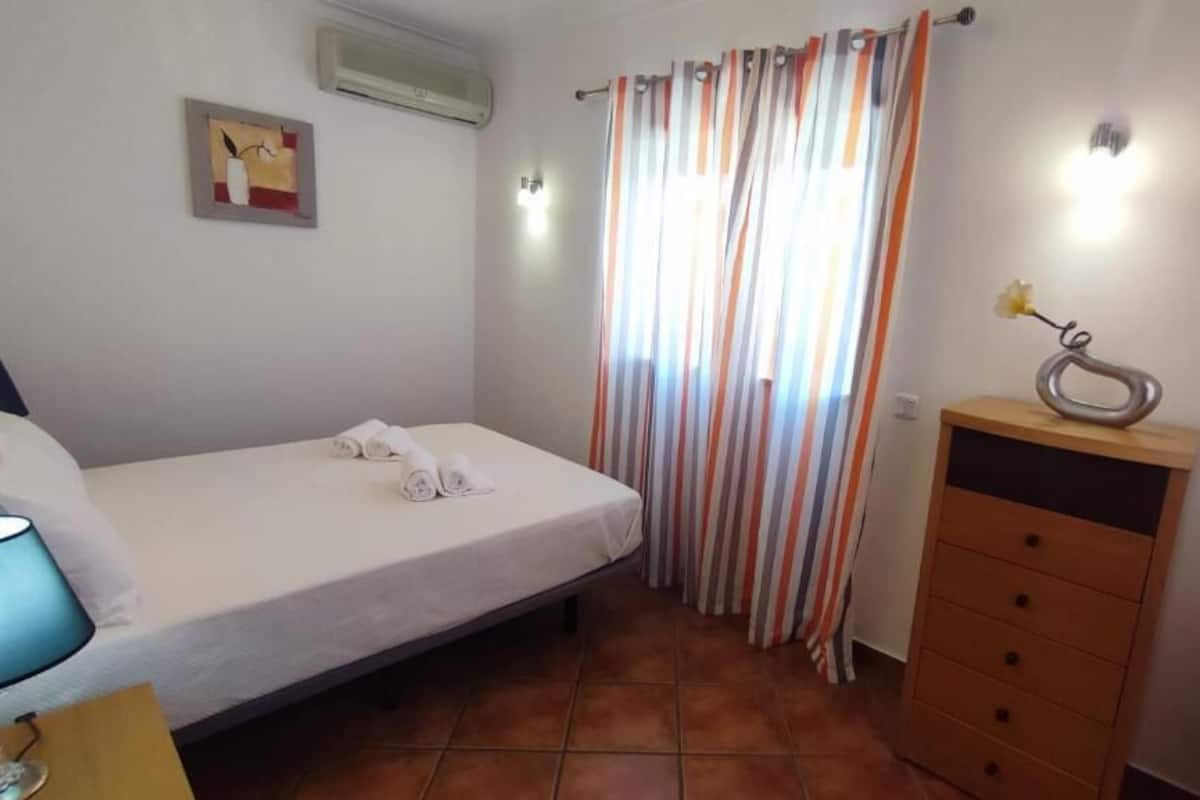 Apartment, 2 Bedrooms, Ground Floor | In-room safe, iron/ironing board, individually furnished, bed sheets