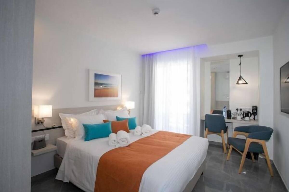 Memory foam beds, free minibar items, in-room safe