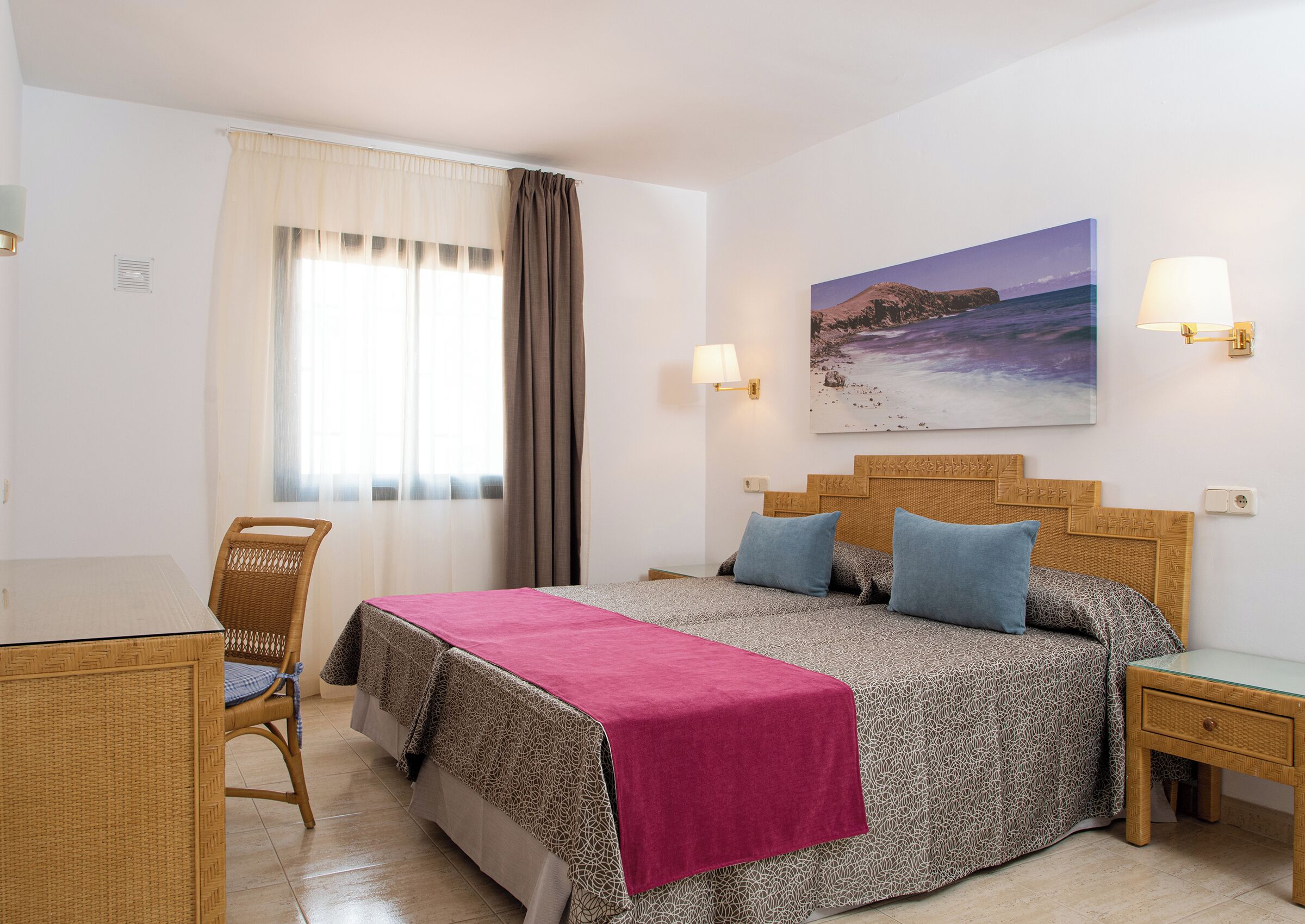 Luxe beddengoed, een kluis op de kamer, een bureau