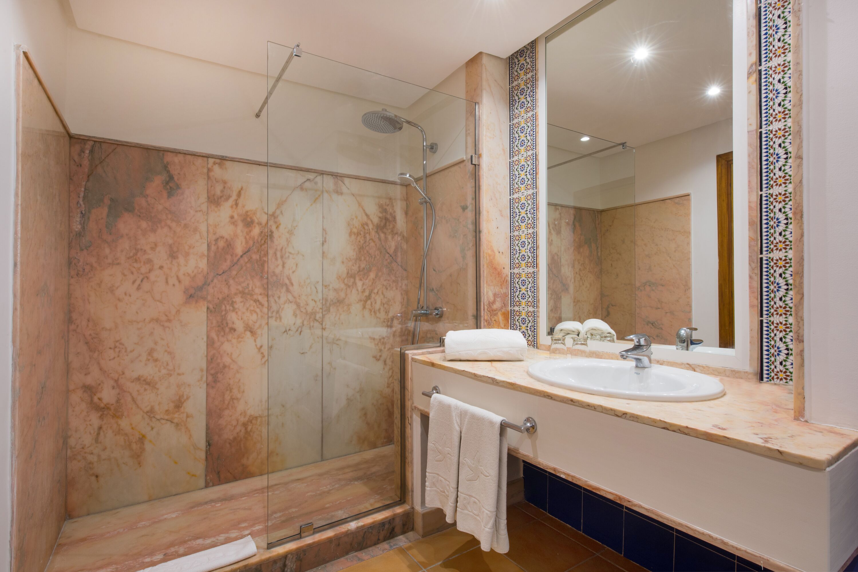 double room, partial sea view | bathroom | bathtub, eco-friendly toiletries, hair dryer, towels