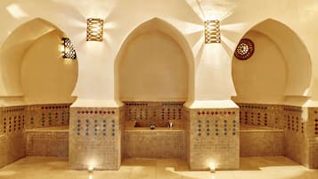 Experience the tranquil atmosphere of this traditional space, featuring a central seating area with a bench and table.