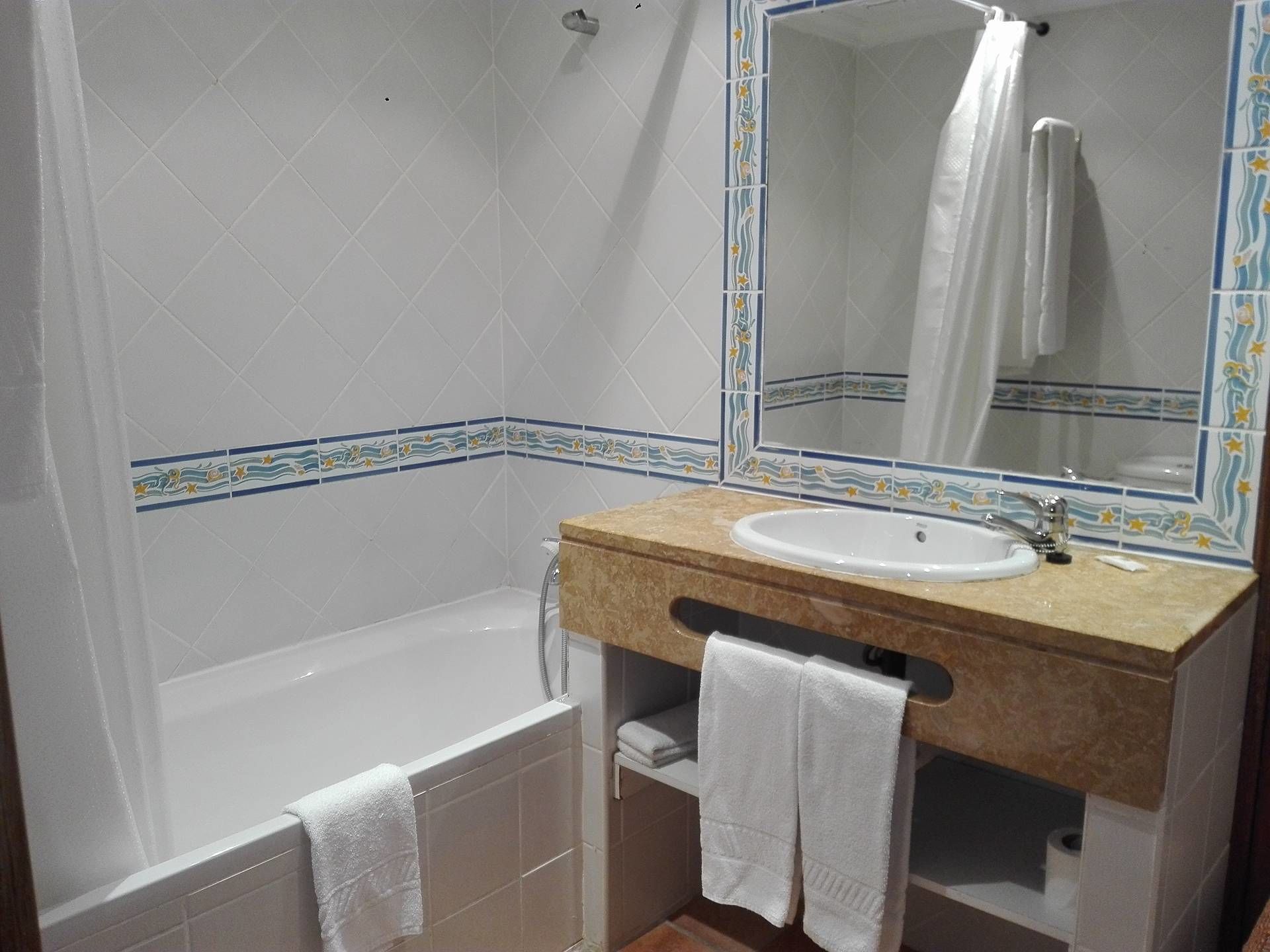 economy double or twin room | bathroom | bathtub, free toiletries, hair dryer, towels