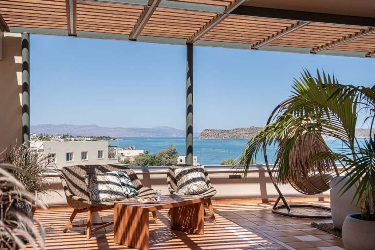 honeymoon suite with outdoor hot tub & sea view | balcony