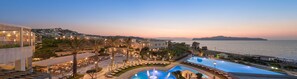 A resort with a pool, outdoor seating, and a view of the sea. - Cretan Dream Resort and Spa (Chania)