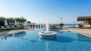 2 outdoor pools, pool loungers, lifeguards on site
