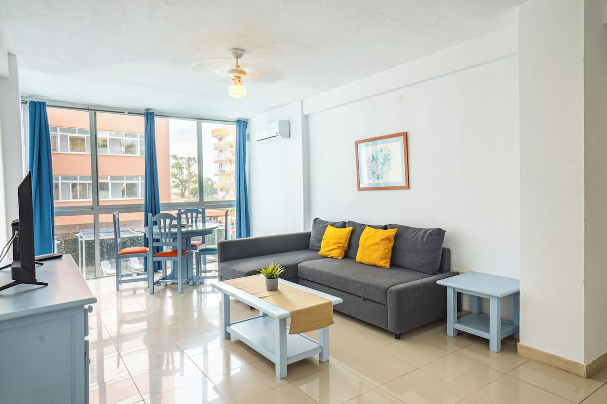 Apartment, 1 Bedroom, Balcony | Living area | 42-inch TV with digital channels