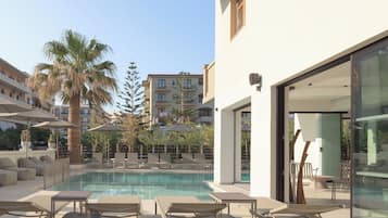 Indoor pool, 2 outdoor pools, open 10:00 AM to 6:00 PM, pool umbrellas