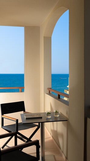 Suite (Side Sea View) | Desk, blackout drapes, soundproofing, bed sheets - Theartemis Palace (Rethymno)