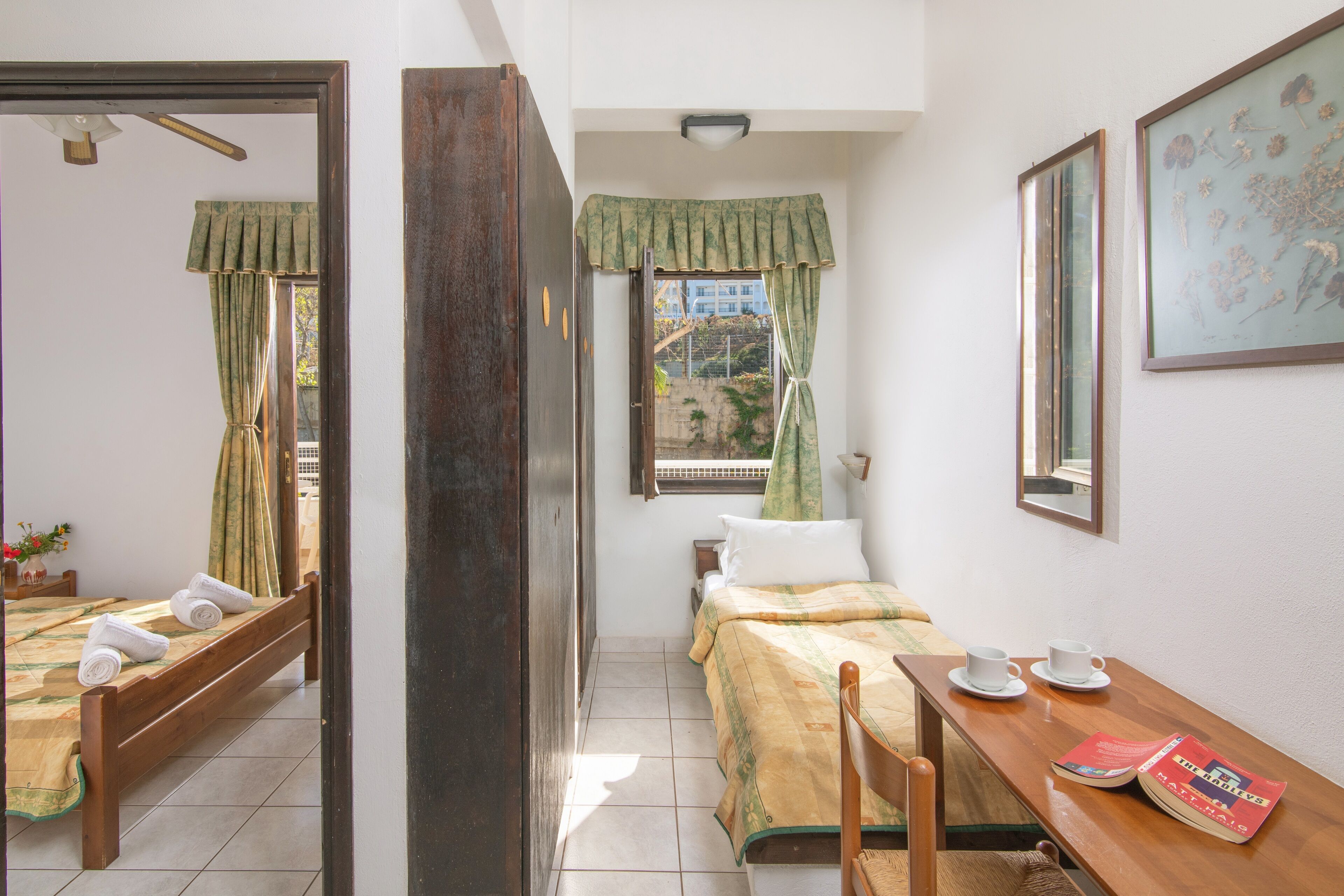 apartment with garden or pool view | individually decorated, blackout curtains, soundproofing