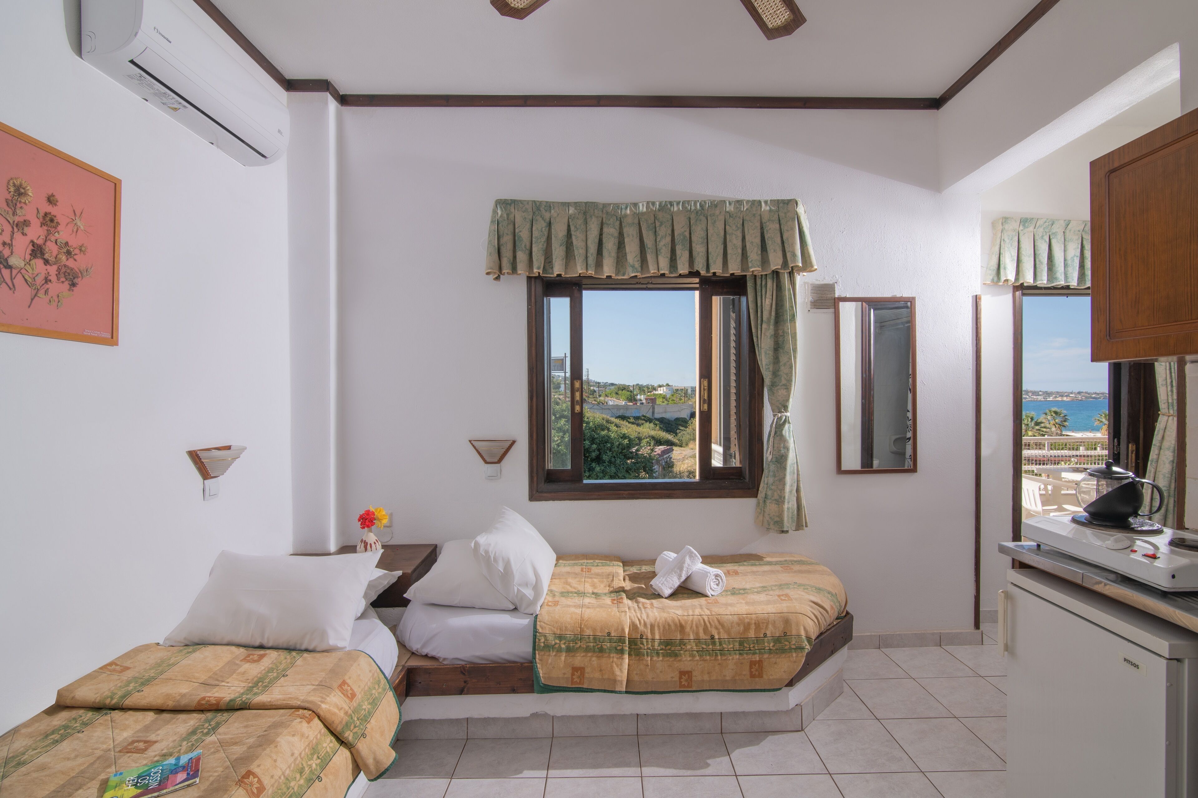 one bedroom apartment with sea view | living area | 14-inch tv with cable channels