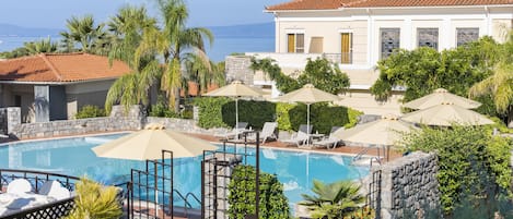 Outdoor pool, pool umbrellas, pool loungers