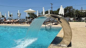 2 outdoor pools, pool umbrellas, pool loungers